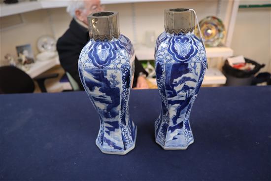 A pair of Chinese blue and white canted rectangular baluster vases, Kangxi period, H.26.7cm, one neck with section lacking obscured by